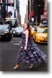 Model in Times Square, New York City, promoting Mackintosh Tartan
